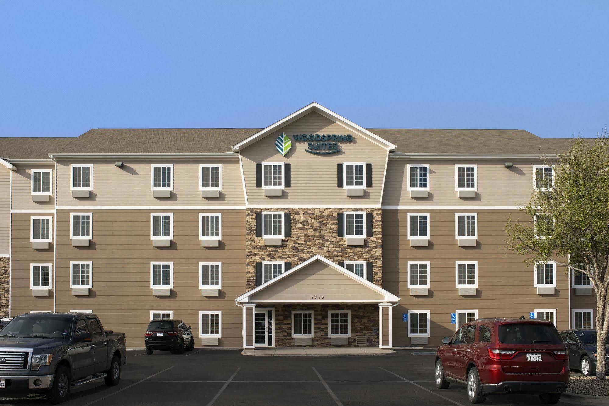 Woodspring Suites Midland Bagian luar foto